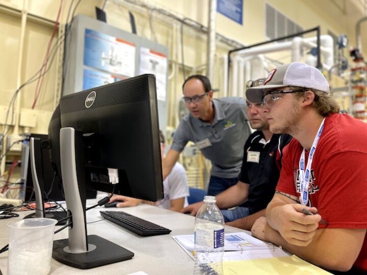 Process Control workshop participants at a monitor